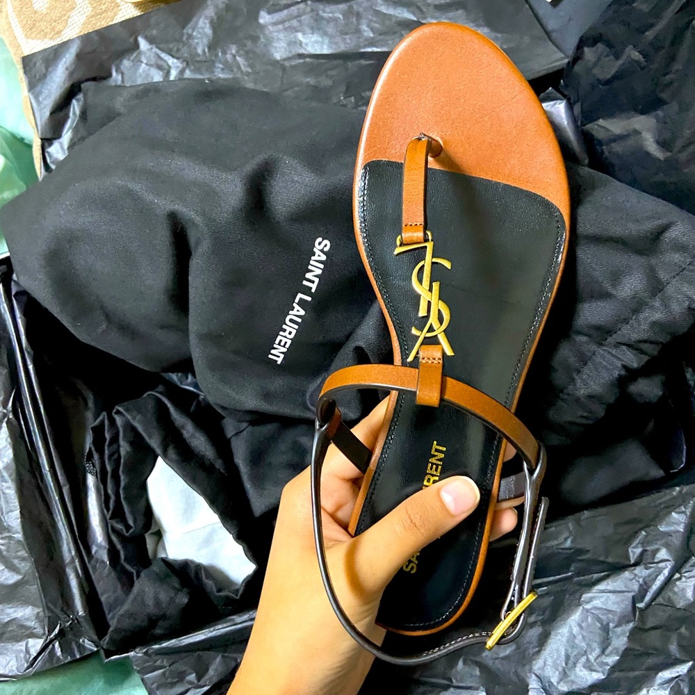 YSL Cassandra flat sandals